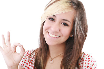 Image showing bright picture of lovely teenage girl showing ok sign 