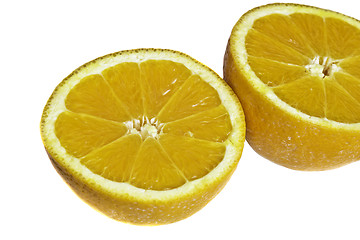 Image showing Closeup on two orange halfs