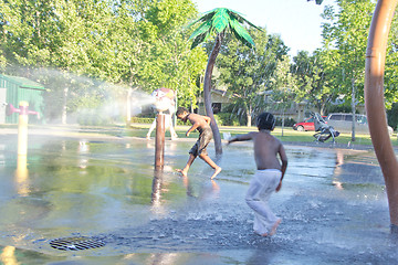 Image showing Kids playing in a water splash park