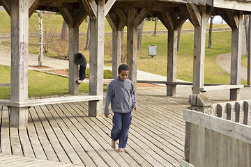 Image showing Bare foot on the patio