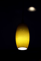 Image showing Amber colored hanging ceiling light