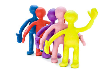 Image showing Group of plasticine puppets signing by hands