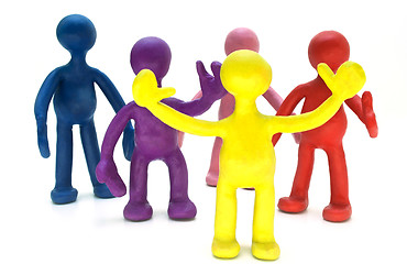 Image showing Group of plasticine puppets on white background