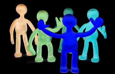 Image showing Group of plasticine puppets on black background