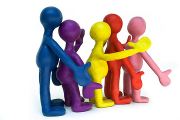 Image showing Group of plasticine puppets on white background