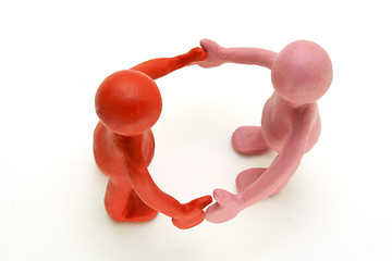 Image showing Pair of plasticine puppets on white background