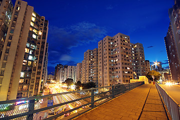 Image showing modern urban city at night with freeway traffic