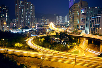 Image showing urban area dusk, busy traffic 