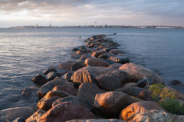 Image showing Pier from stones on a sunset