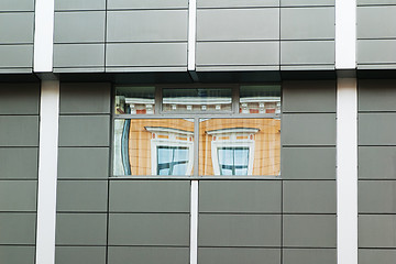 Image showing Reflection of the ancient house in windows modern  in Riga