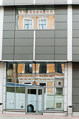 Image showing Reflection of the ancient house in windows modern  in Riga