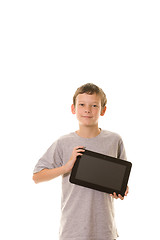 Image showing young boy holding tablet computer
