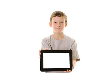 Image showing Young boy holding tablet computer