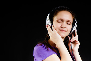 Image showing smiling girl in the headphones