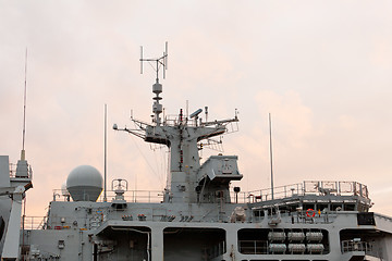 Image showing Sunset behind Royal Navy warship