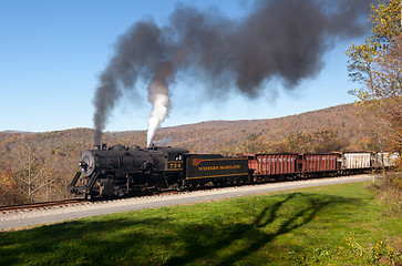 Image showing WM Steam train powers along railway