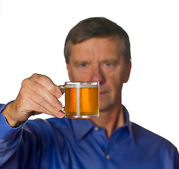 Image showing Senior man with glass of beer