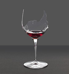 Image showing Demon drink red wine in glass