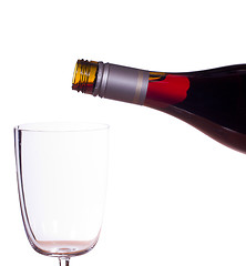 Image showing Red wine being poured into glass