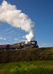 Image showing WM Steam train powers along railway