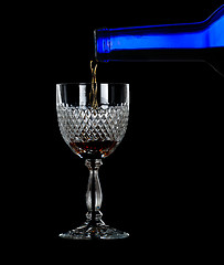 Image showing Sherry or port being poured into glass