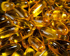 Image showing Close up of fish oil capsules