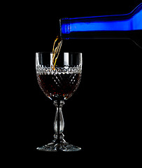 Image showing Sherry or port being poured into glass