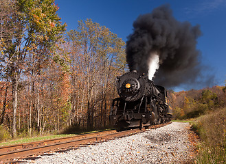 Image showing WM Steam train powers along railway