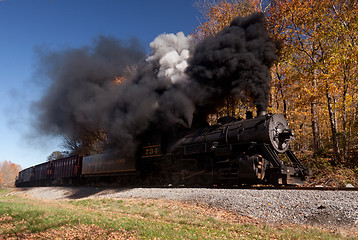 Image showing WM Steam train powers along railway