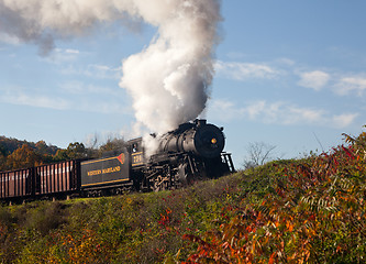 Image showing WM Steam train powers along railway