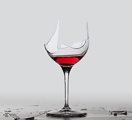 Image showing Demon drink red wine in glass