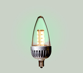 Image showing Green ecological LED bulb with path