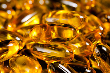Image showing Close up of fish oil capsules