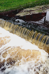 Image showing River flow power. Little stair or waterfall down.