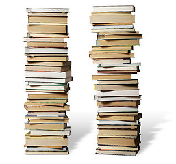 Image showing many books on each other