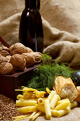 Image showing still life with chest, nuts, pumpkin, bread 