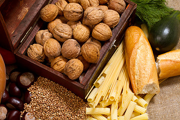 Image showing still life with chest, nuts, pumpkin, bread 