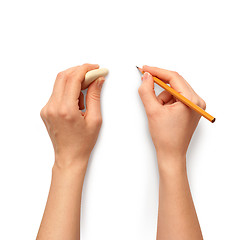 Image showing human hands with pencil and erase rubber