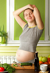 Image showing pregnant woman on kitchen