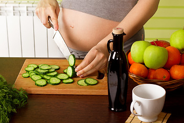 Image showing pregnant woman on kitchen