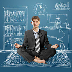 Image showing businessman in lotus pose