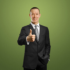 Image showing asian businessman in black suit shows well done