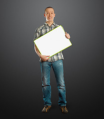 Image showing asian male with write board in his hands