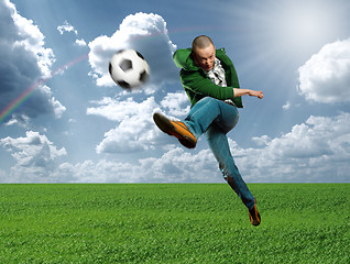 Image showing asian soccer player outdoors