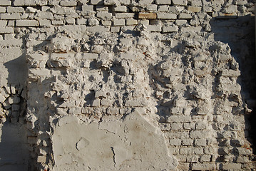 Image showing Jagged white painted brick wall