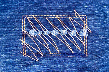 Image showing Drawing on denim