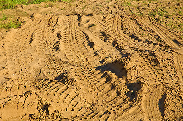 Image showing Tire tracks of different cars