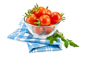 Image showing Tomatoes in a glass on a napkin