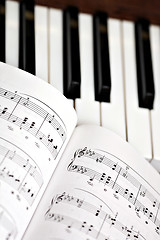 Image showing Piano and lyrics book