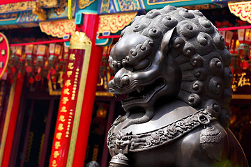 Image showing Bronze lion in chinese temple